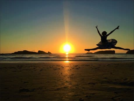 ballerina dancing on the beach