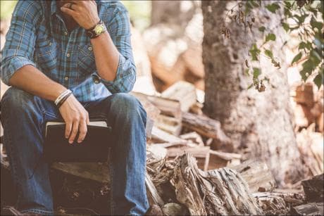 person sitting and contemplating