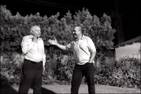 father and son black and white photo