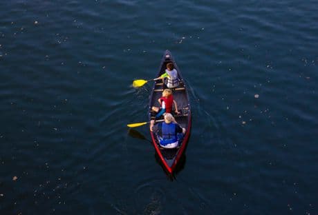 picture of children in red canoe