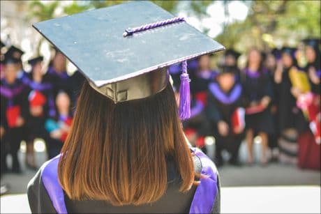 a graduate waiting for her diploma