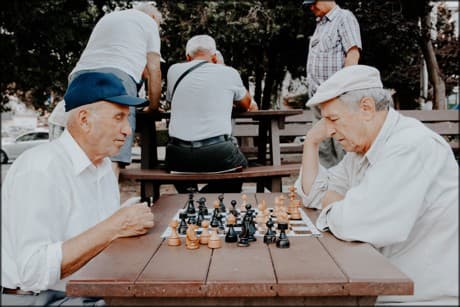 two older men playing chess