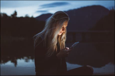 women looking at her phone